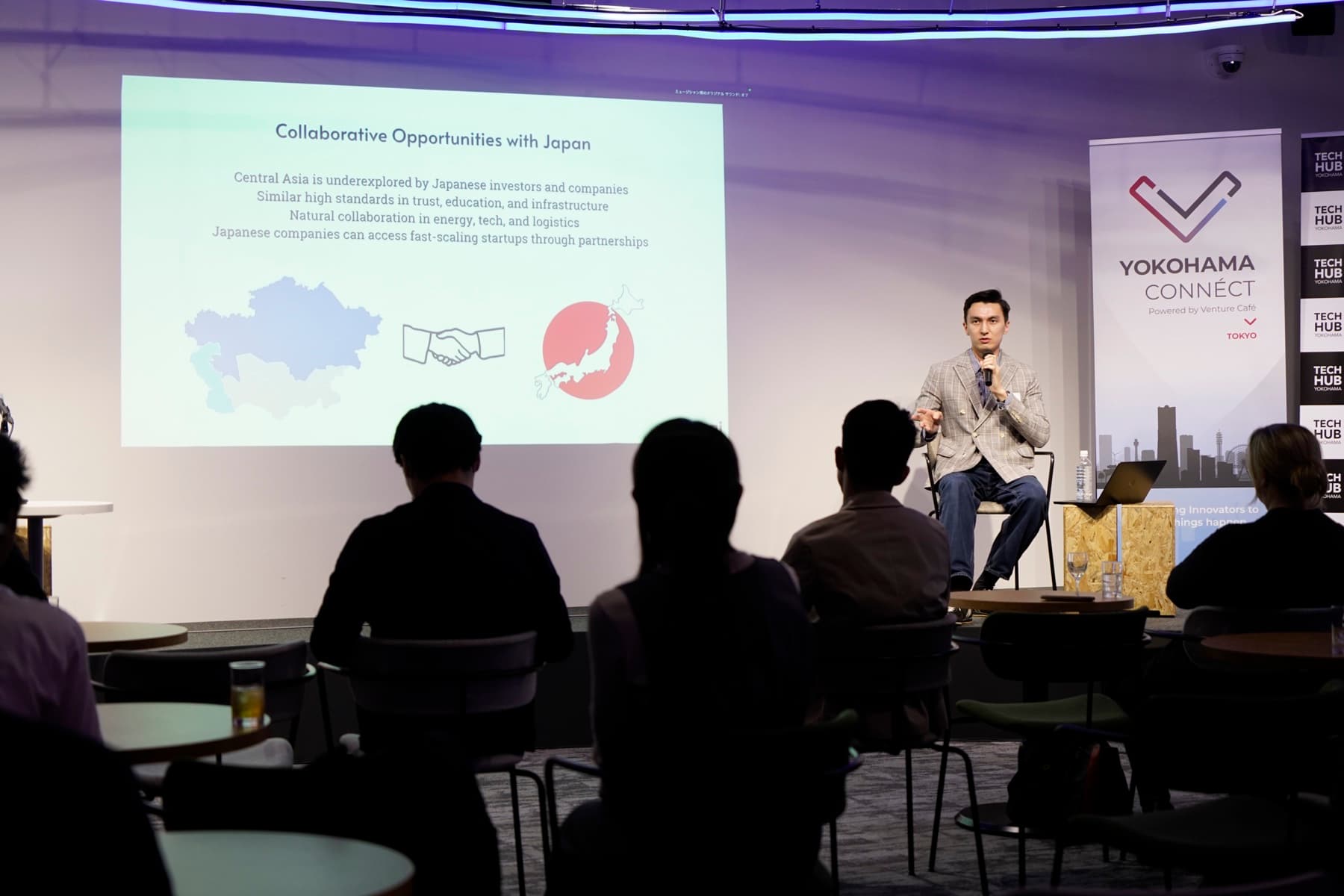 Yerzhan Karatayev speaking at a business event in Japan